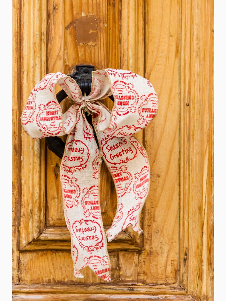 Rustic Wooden Door Decorated With Season's Greetings Bow Ribbon For Christmas Front Door by Nmallia