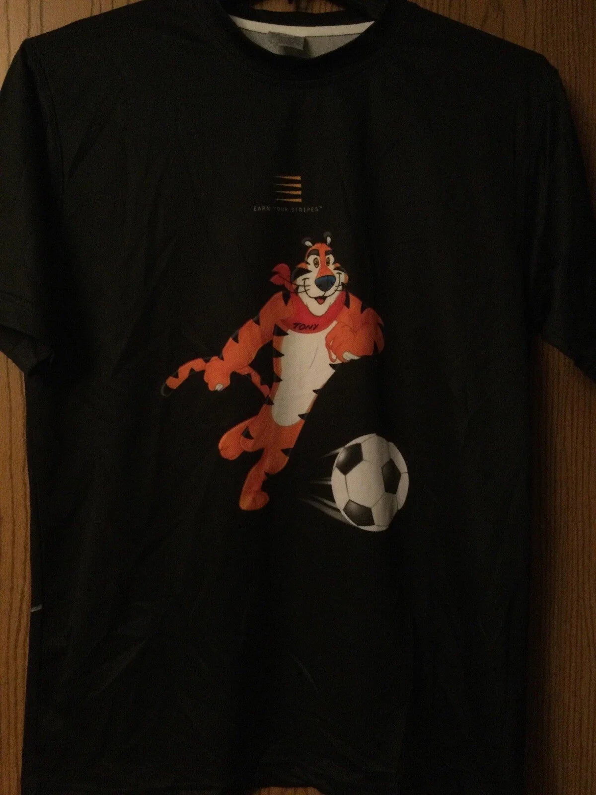 Tony The Tiger (Playing Soccer) - “Earn Your Stripes”- 2008 Black Shirt -Adult M Unisex