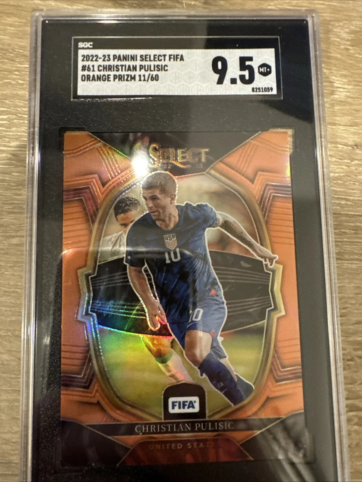 2022-23 Panini Select FIFA Terrace Christian Pulisic #61 Orange Prizm /60 Unisex