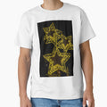 Golden Illuminated Star Christmas Lights Decoration At Night For Holiday Festive Display by Nmallia