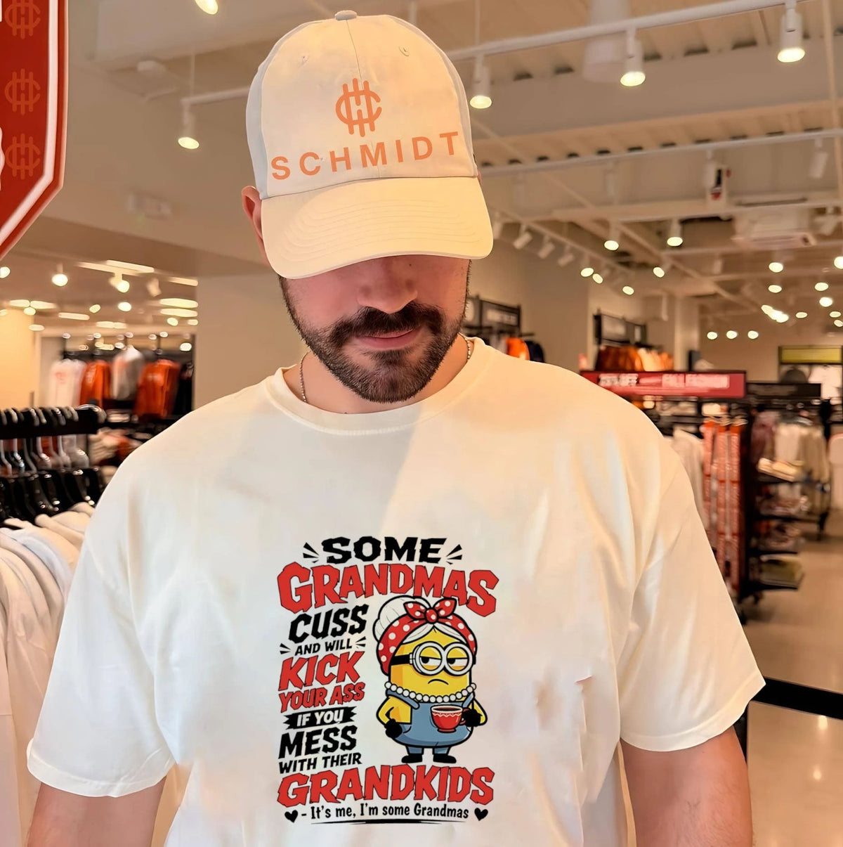 Some grandmas cuss and will kick your ass if you mess with their grandkids Minion shirt Unisex